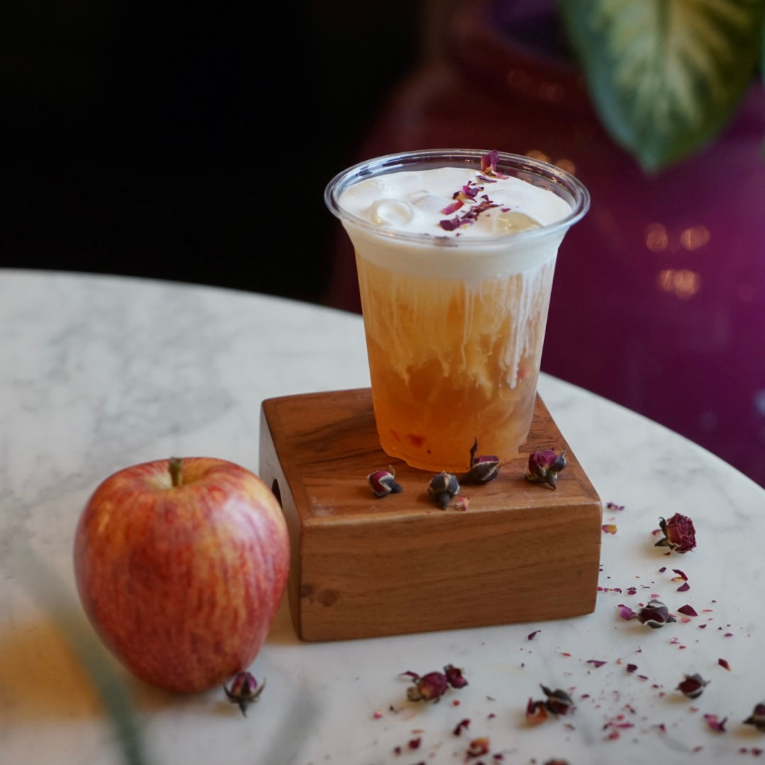 Autumn Grey tea with salted cold foam and rose petals